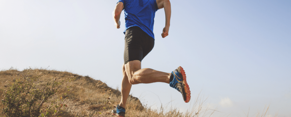 man running up hill