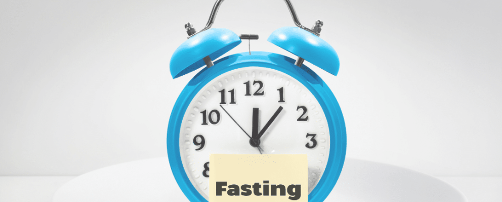 clock with fasting label on it