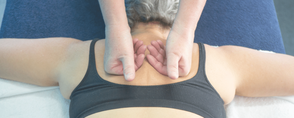 chiropractor giving back massage