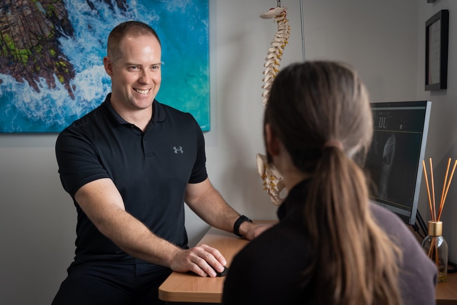 Chiropractor appointment with patient